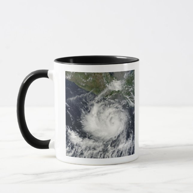 Caneca Vista de satélite da tempestade tropical Darby (Esquerda)
