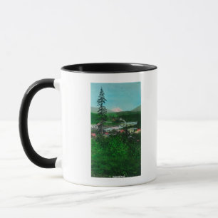 Caneca Vista distante do pico e da cidade da geleira