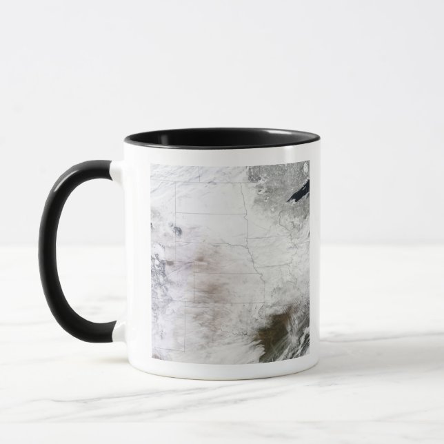 Caneca Vista por satélite de uma enorme tempestade de inv (Esquerda)