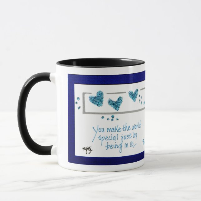 Caneca Você faz o mundo especial apenas por estar nele. (Esquerda)