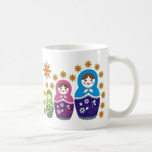 Canecas da boneca de Matryoshka do russo