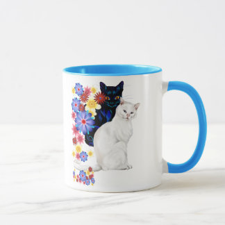 Canecas preto e branco dos gatinhos do jardim