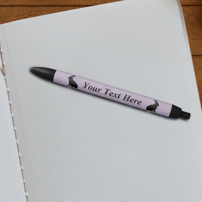 Caneta Preta Coelho Negro Silhout Páscoa (Two black silhouette Easter rabbits sitting on pretty purple writing pen.)