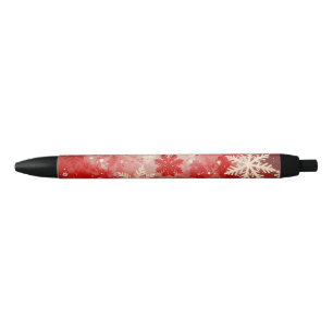 Caneta Preta Fundo vermelho festivo com flocos de neve brancos