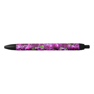 Caneta Preta Grande campo de tulipas roxas