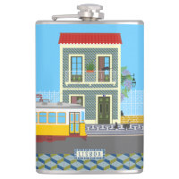 Casa velha de Lisboa com gatos e elétrico amarelo