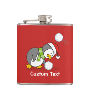 Cantil Pinguim de Natal ganhando uma bola de neve