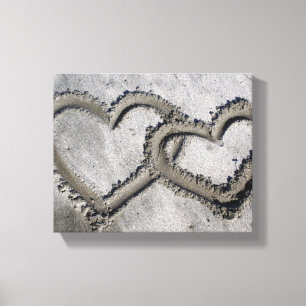 Canvas dos corações do amor da areia