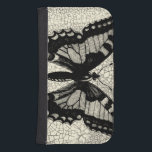 Capa Carteira Para Samsung Galaxy S4 Borboleta Preta e Branca sobre fundo rachado<br><div class="desc">Uma borboleta branca e preta simples é o foco deste impressão pelo Vision Studio. O inseto de dois tons e o fundo rachado dão uma sensação rústica ao pedaço. Peça sua cópia hoje!</div>