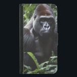 Capa Carteira Para Samsung Galaxy S5 O Rei dos Gorilas da Meia-Noite: Monarca da Flores<br><div class="desc">No fundo do coração da selva esmeralda, onde a luz solar aplicada filtra através da cobertura torrencial, ele reina supremo. Seu pelo obsidiano brilha com um brilho de poder, ondulando sobre um corpo esculpido pela força e pela resiliência. O Rei da Meia-Noite, um gorila negro colossal com olhos que guardam...</div>