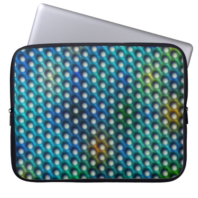 Capa Para Notebook azul esverdeada com com cír que parecem furos (Frente)