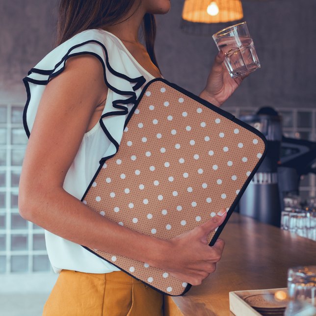 Capa Para Notebook Dotty Delight Orange (A woman is standing with a laptop in Dotty Orange Green Laptop Sleeve.)