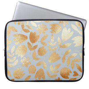 Capa Para Notebook Douradas flores, fundo azul, imitação de folhas.