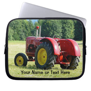 Capa Para Notebook Trator vermelho e amarelo antigo no campo