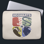 Capa Para Notebook Vintage HOGWARTS™ Stamped Crest<br><div class="desc">Show your house pride in bold, vintage-inspired style with this striking Hogwarts™ crest design. Featuring graphic silhouettes representing the four iconic houses — Gryffindor™, Slytherin™, Hufflepuff™, and Ravenclaw™ — this artwork blends classic symbolism with a modern, retro aesthetic. Each house emblem is set within a clean, color-blocked shield, creating a...</div>