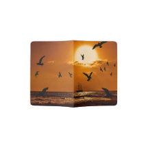 Pôr do sol com aves marinhas