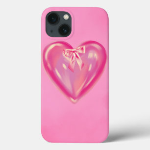 capinha de iphone 13 com laço de coração rosa.