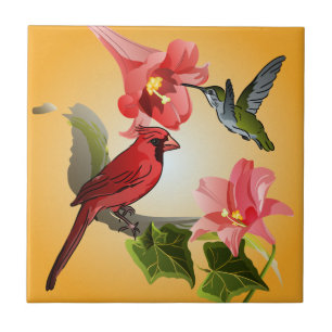Cardeal e colibri com lírios e a hera cor-de-rosa