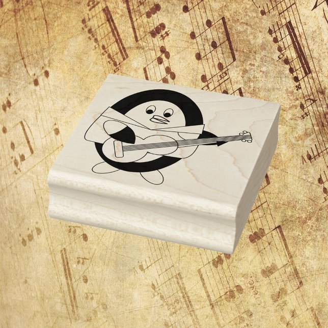 Carimbo De Borracha Pinguim tocando guitarra de Cuta (A cute stamp of a penguin playing guitar.)
