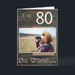 Cartão 80 so What Rustic Wood Funny 80th Birthday Photo<br><div class="desc">80 so What Rustic Wood Funny 80th Birthday Photo Card. It comes with an inspirational quote I`m 80 So What on a rustic dark wood texture background and is perfect for a person with a sense of humor. You can change the age and personalize it with your photo. Add your...</div>