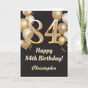 Cartão 84.º aniversário Balões Negros e Dourados Confetti