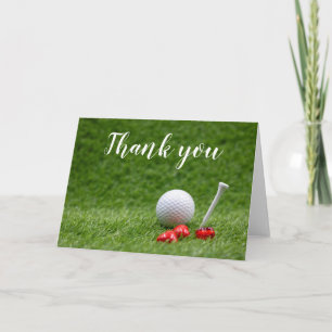 Cartão A bola de golfe com tênis e coração vermelho está