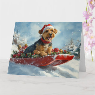 Cartão Airedale Dog em Sledge Deixe-o nevar no Natal