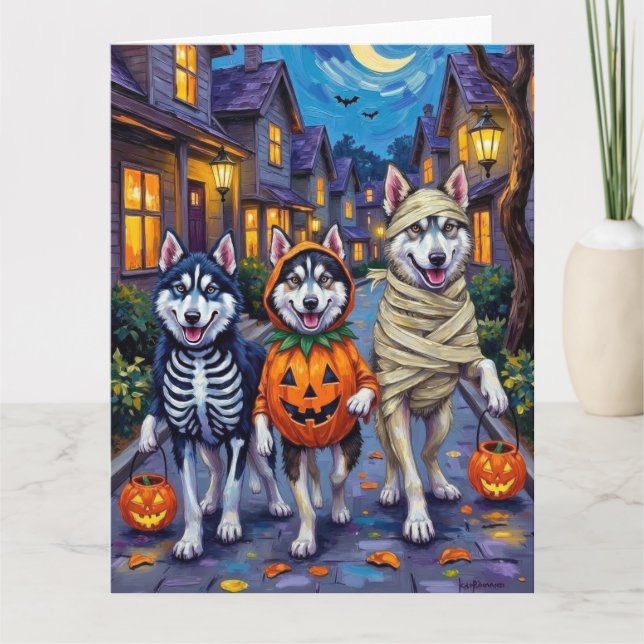 Cartão Alaskan Malamute Dogs Trick-or-Tratating Halloween (Frente)