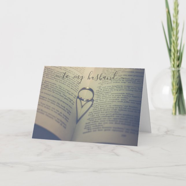 Cartão Anel de casamento em livro aberto aniversário ou d (Frente)