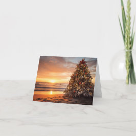 Cartão Árvore Natal de Natal na praia em Sunrise