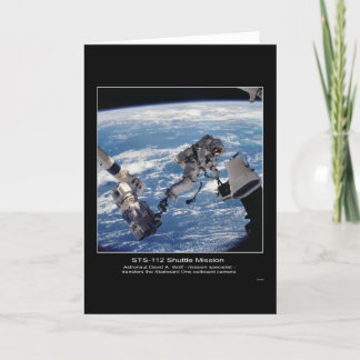 Cartão Astronaut David A. Wolf transfers the Starboard O