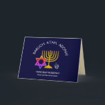 Cartão BARUCH ATAH ADONAI | Abençoações de Chanucá<br><div class="desc">Na moda, moderno HANUKKAH BESSINGS. Design mostra um MENORAH dourado com uma ESTRELA multicolorido DE DAVID e cinza prateada DREIDEL. No topo, há um texto curvo que diz BARUCH ATAH, ADONAI (Abençoado seja você, Ó Deus) e abaixo do texto lê HANUKKAH BLESSINGS FROM OUR HOME TO YOURS. No dentro, há...</div>