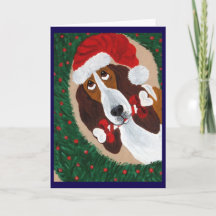 Basset Hound Papai Noel olhando através da Coroa d