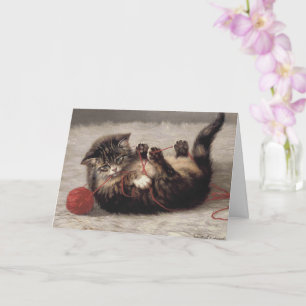 Cartão Berço de Gato, Um Gato Brincando com um Novelo de 