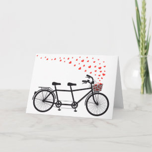 Cartão bicicleta tandem com corações vermelhos