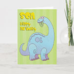 Cartão Birthday Son Blue Dinossaur<br><div class="desc">Um grande dinossauro azul comendo uma folha,  com uma saudação de aniversário ao filho num fundo verde.</div>