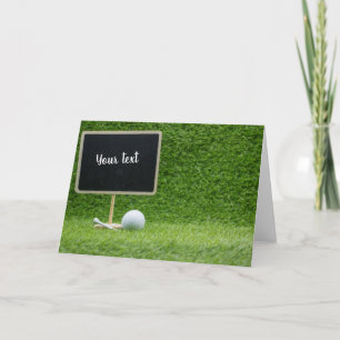 Cartão Bola de golfe com quadro de vazio sobre grama verd