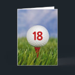 Cartão Bola de Golfe de 18º aniversário no Tee Vermelho<br><div class="desc">Bola de golfe branca na teta vermelha na grama, no 18.º aniversário. O número de idade na bola de golfe pode ser mudado.</div>