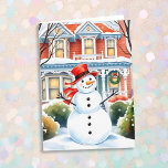 Cartão Bonito Snowman no Subúrbio no Natal<br><div class="desc">Uma bela ilustração aquosa de um boneco de neve em frente a uma casa vitoriana suburbana em um doce bairro acolhedor.</div>