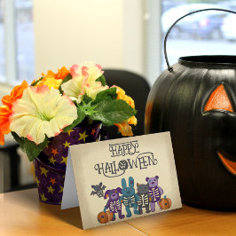 Cartão Bons animais de esqueleto e abóboras no Halloween