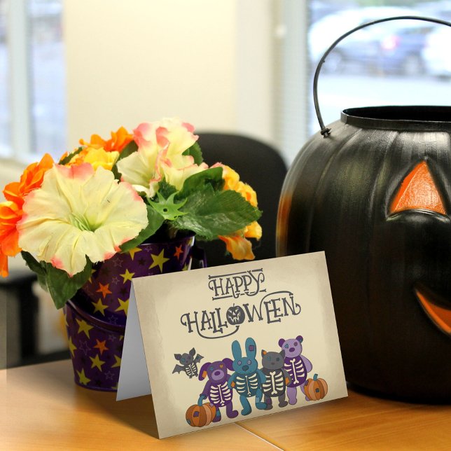 Cartão Bons animais de esqueleto e abóboras no Halloween (Criador carregado)