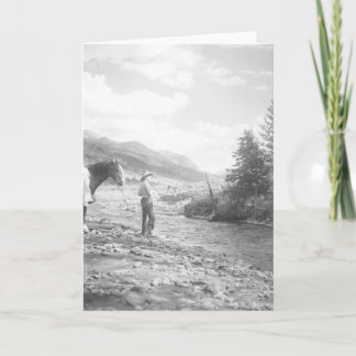 Cartão Boy fly fishing in a creek