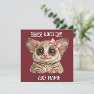 Cartão Bushbaby Fêmea: Animal Bebê com Laço e Flores Past