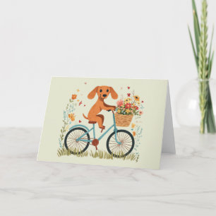Cartão Cachorro Dachshund Fofo Andando de Bicicleta entre