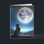 Cartão Cachorro Observando Papai Noel e Reindeer<br><div class="desc">Um cão German shepherd olha para uma lua de cheio onde os Papais noeis e as renas são silenciados contra uma lua de cheio brilhante</div>