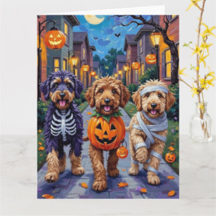 Cartão Cães Bernedoodle fazendo Trick-or-Treating no Dia 