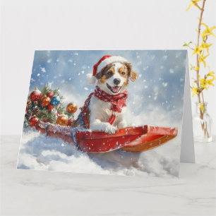 Cartão Cão Brittany Spaniel em Trenó de Natal