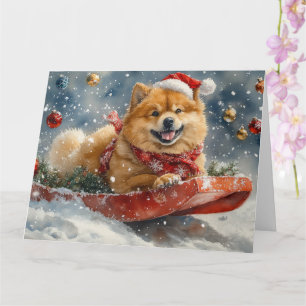 Cartão Cão Chow Chow em Trenó Deixe Nevar Natal