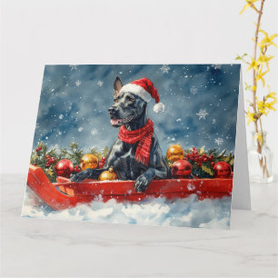 Cartão Cão Dogue Alemão em Trenó Deixe Nevar Natal