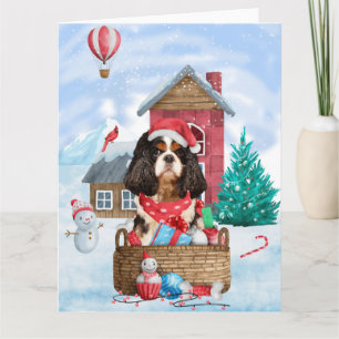 Cartão Cão King Cavalier em Casa de Cachorro no Natal na